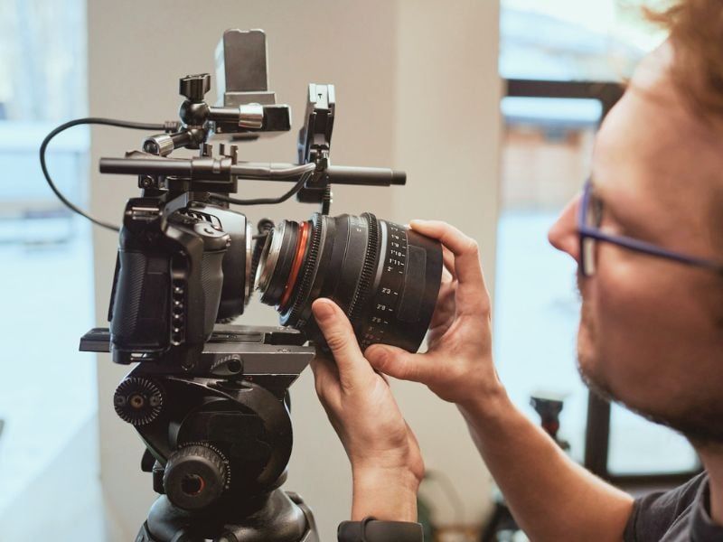 Wedding videographer capturing cinematic footage